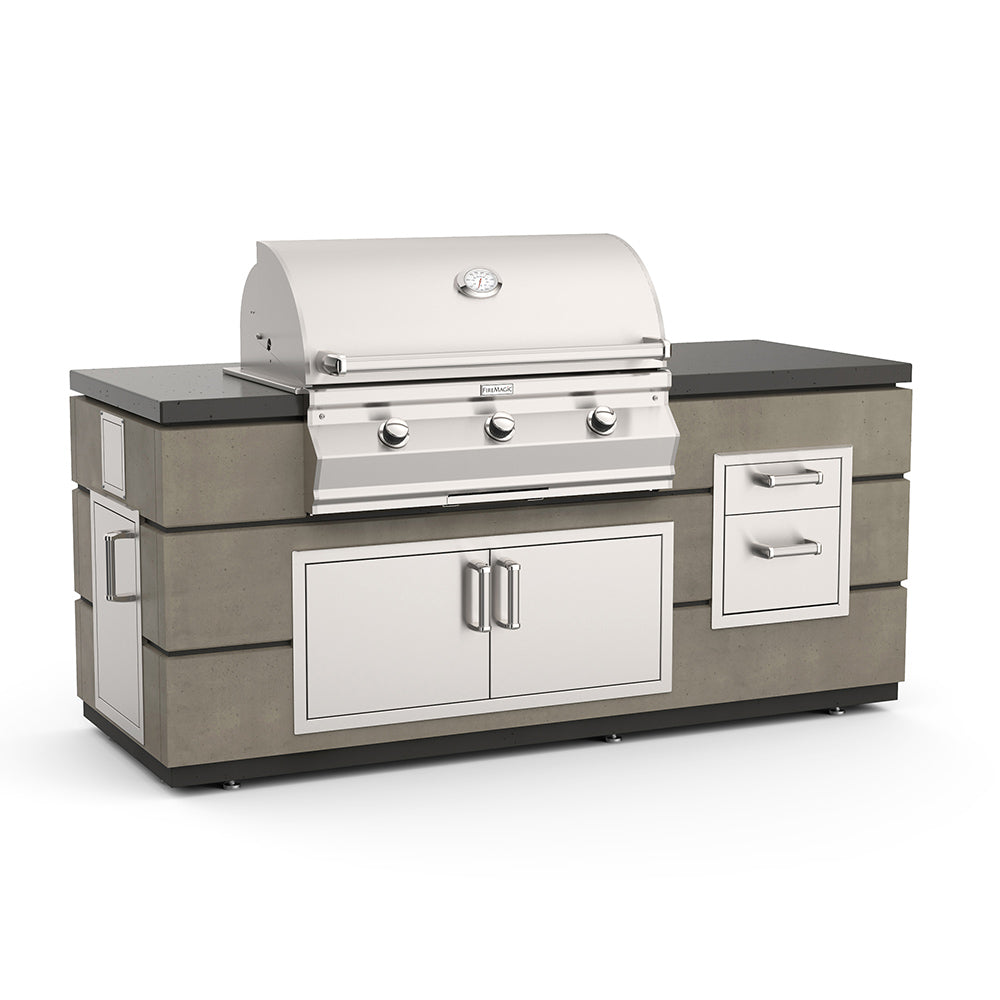 Outdoor kitchen grill island with stainless doors, drawers, and control panel.