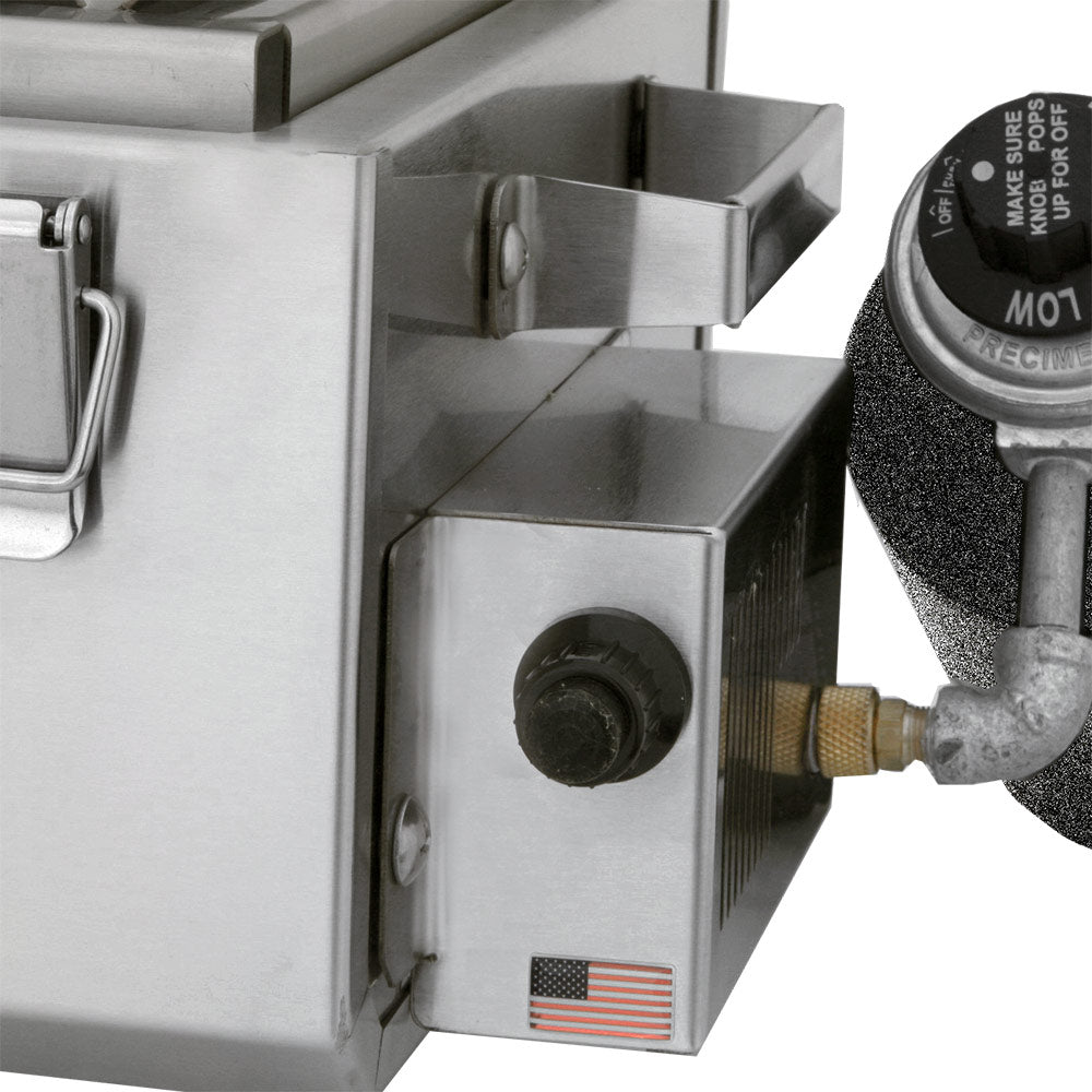 Portable infrared grill close-up of side compartment with knob and regulator connection