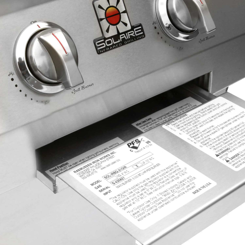 Stainless steel grill control panel with knobs and Infrared grilling badge