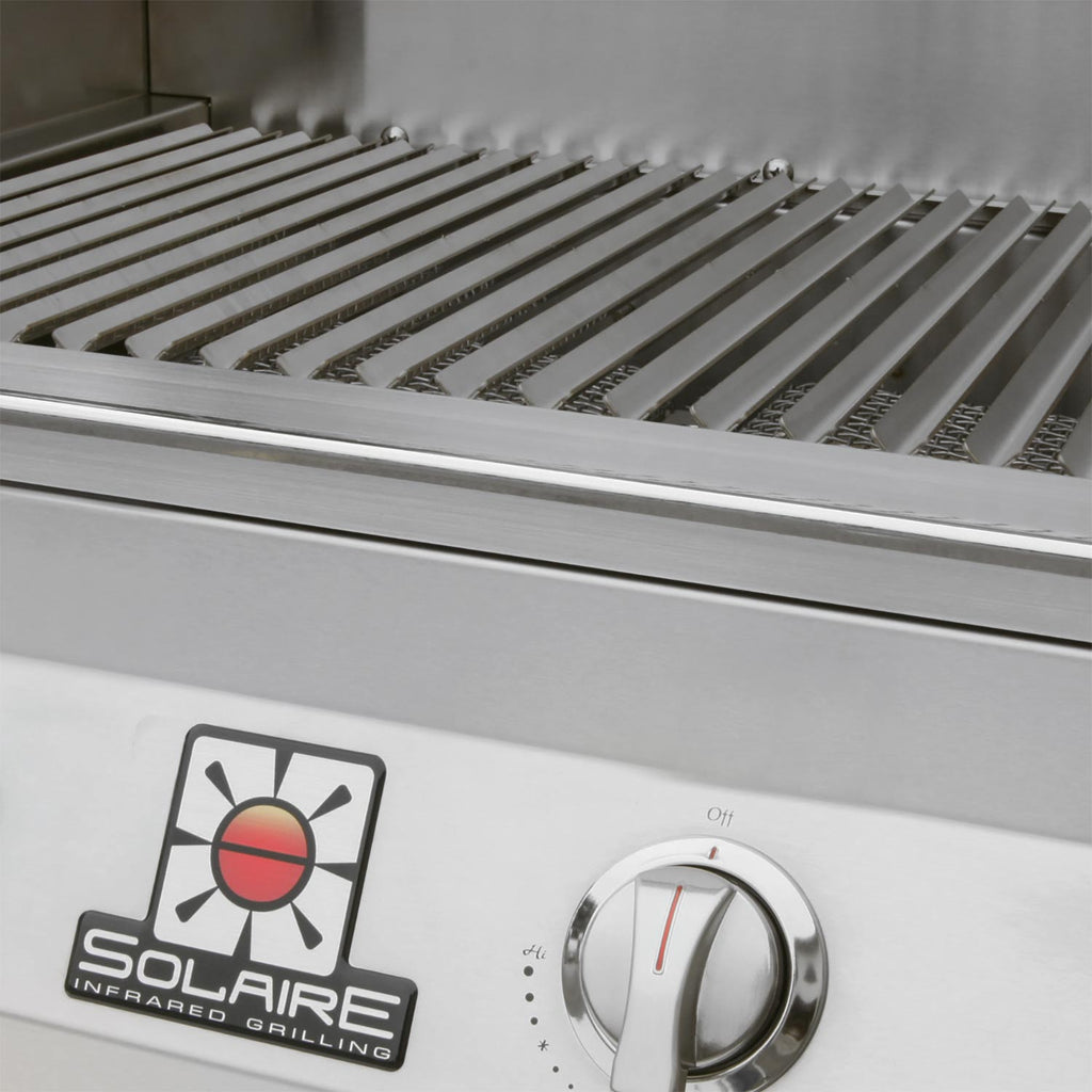 Solaire grill control knob and logo on stainless front panel near grates