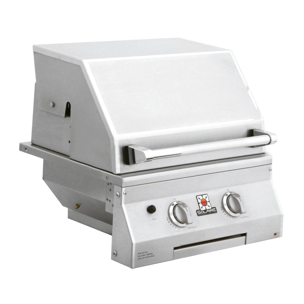 Stainless built-in infrared grill, closed lid and front control knobs