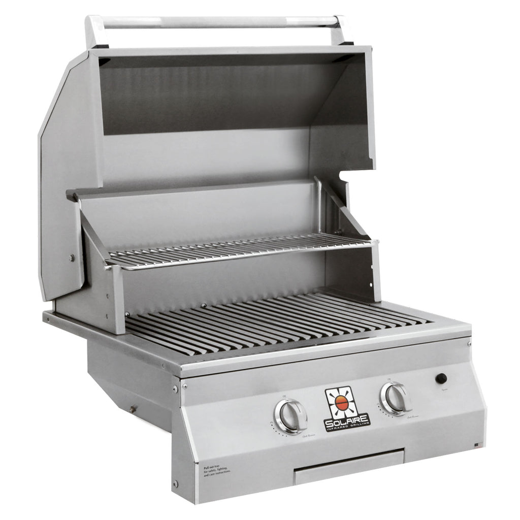 Built-in grill with open lid, cooking grates, and stainless interior