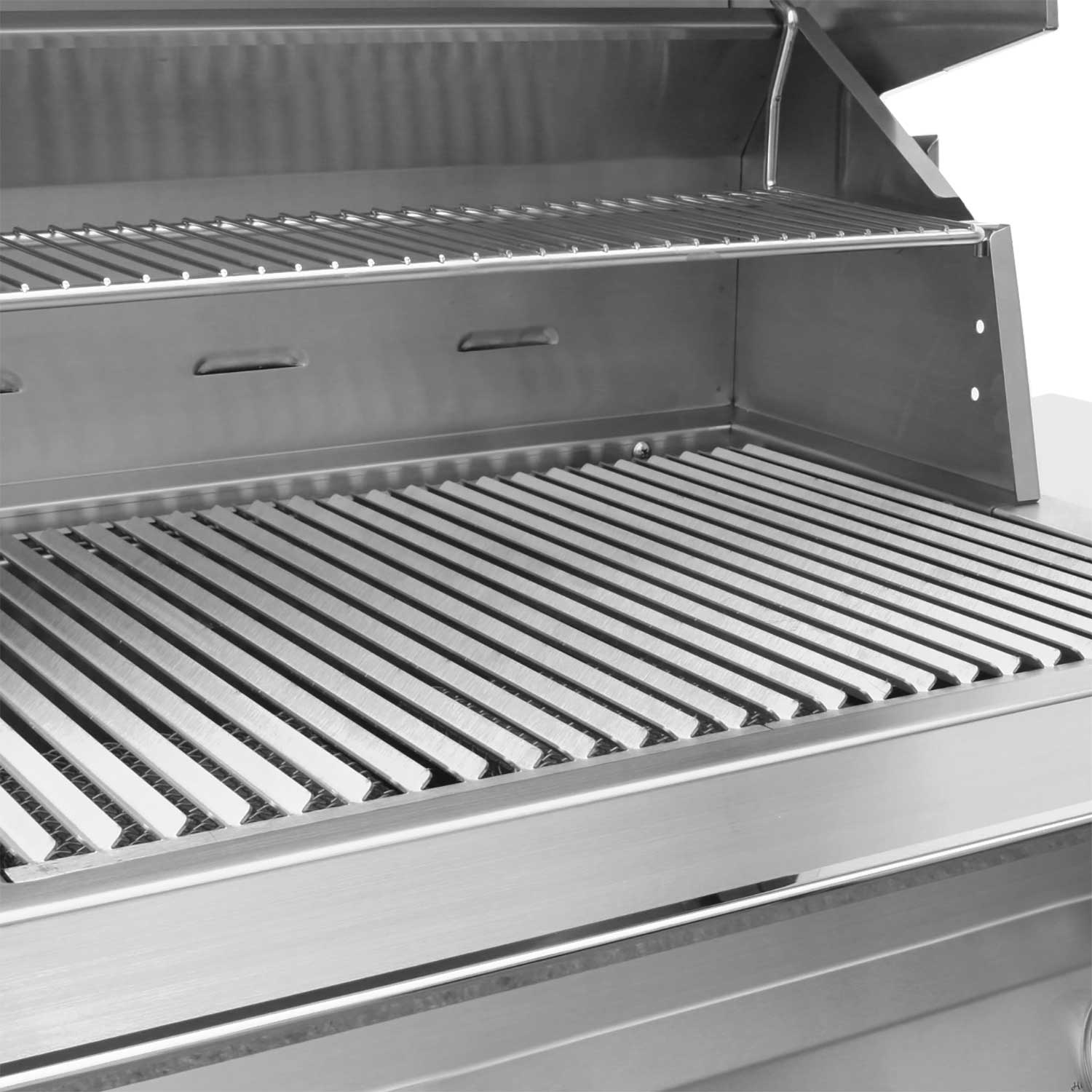 Open grill firebox with stainless cooking grates and heat shield inside