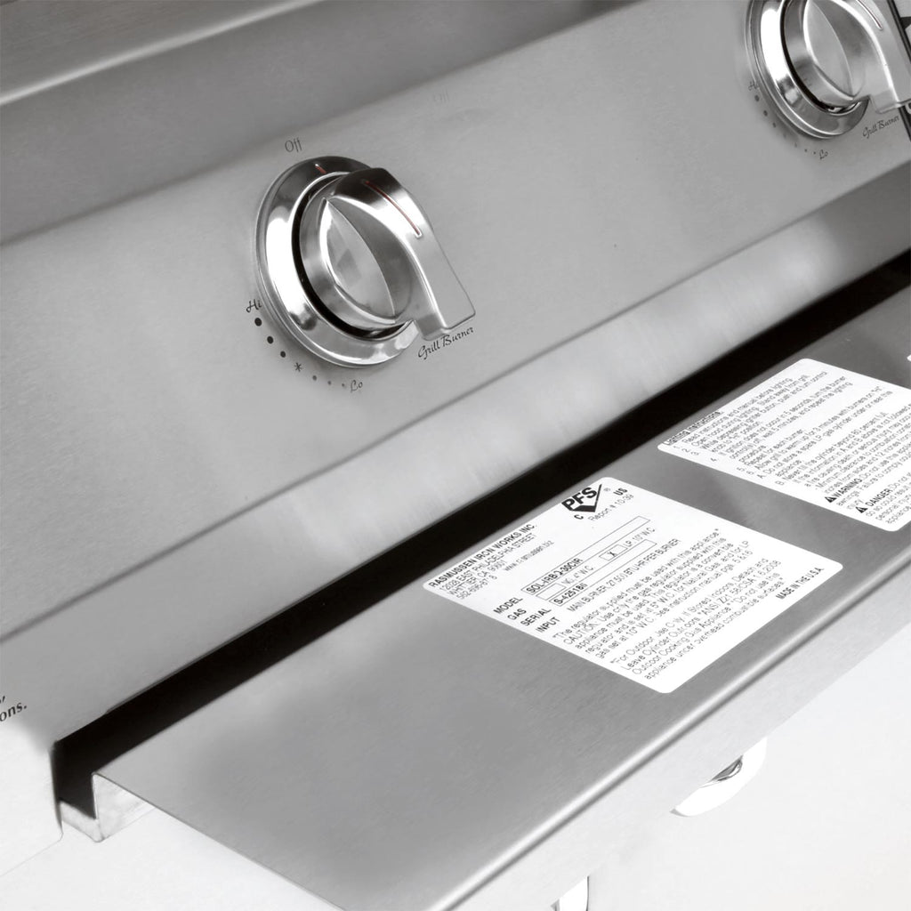 Stainless grill control knobs and burner markings on the front panel