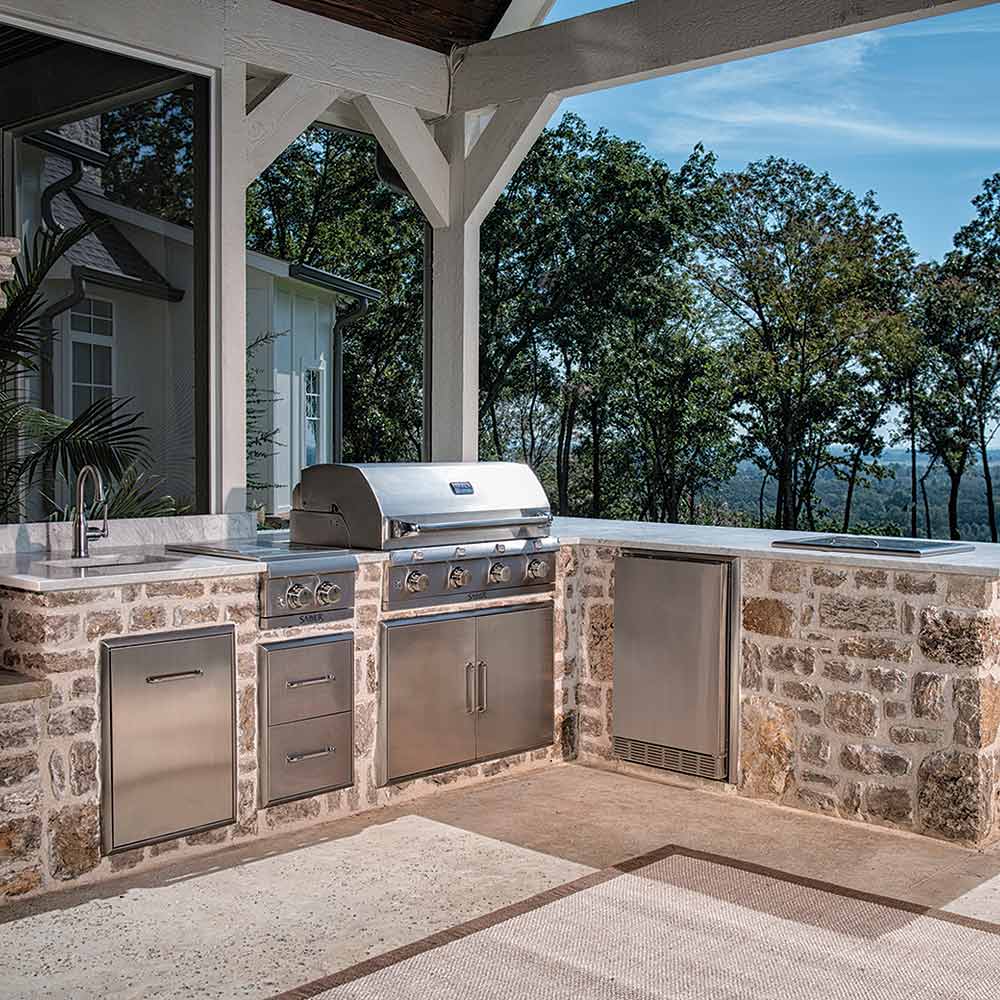 Installed stainless steel double access doors on outdoor countertop cabinet