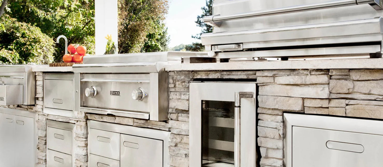 Stainless steel outdoor kitchen cabinets with built-in grill