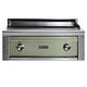 Built-in flat top gas grill with light green front panel and two stainless control knobs