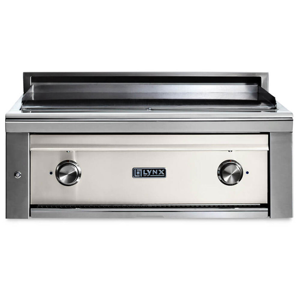 Built-in flat top gas grill with light front panel and two stainless control knobs
