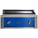 Built-in flat top gas grill with blue front panel and two stainless control knobs