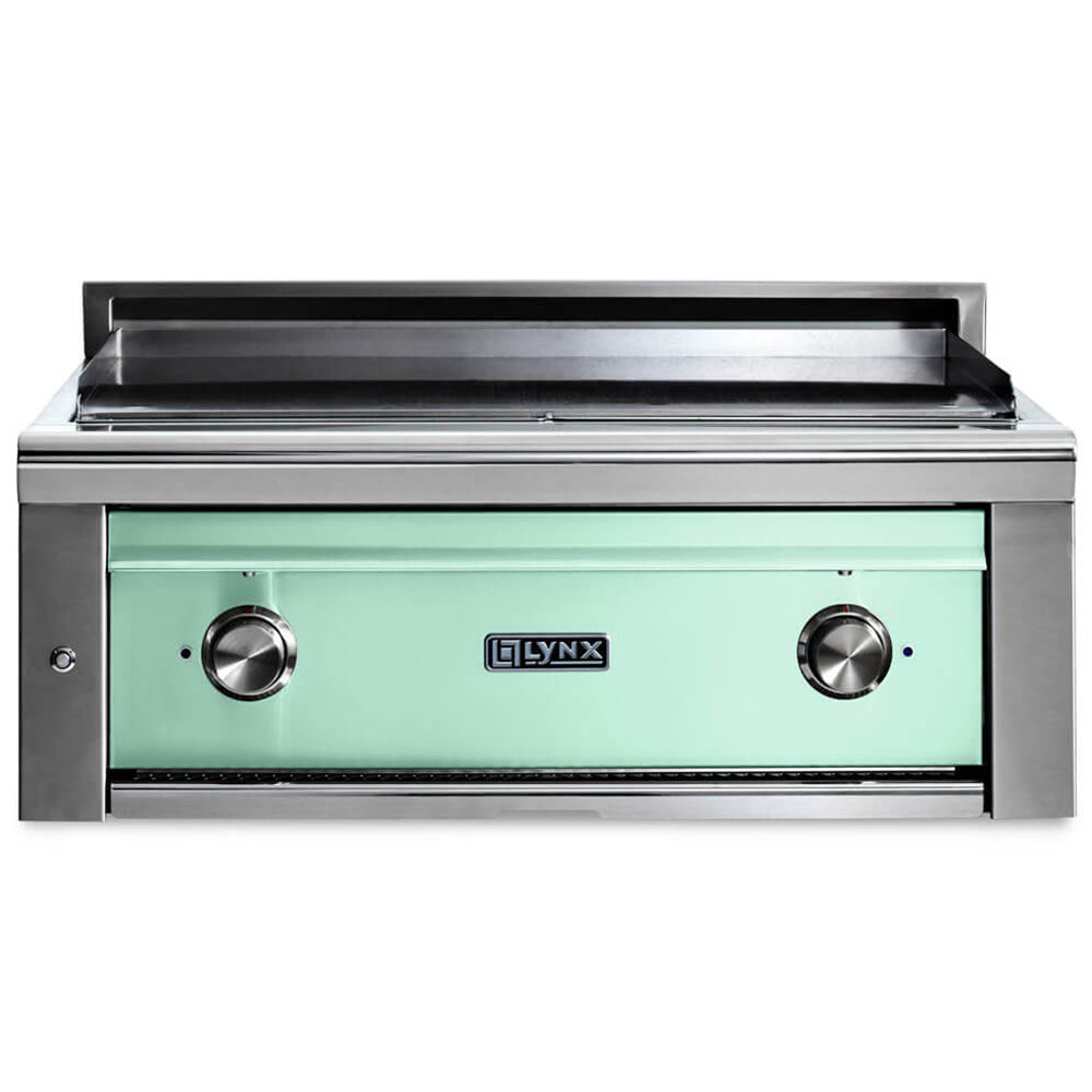 Built-in flat top gas grill with stainless frame, two control knobs, sage green front panel