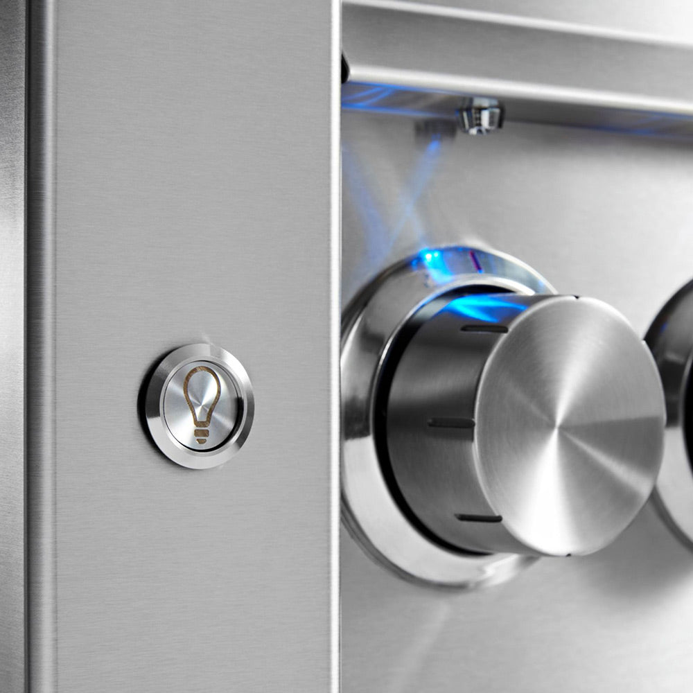 Sedona by Lynx gas grill side control knob and ignition area on stainless panel
