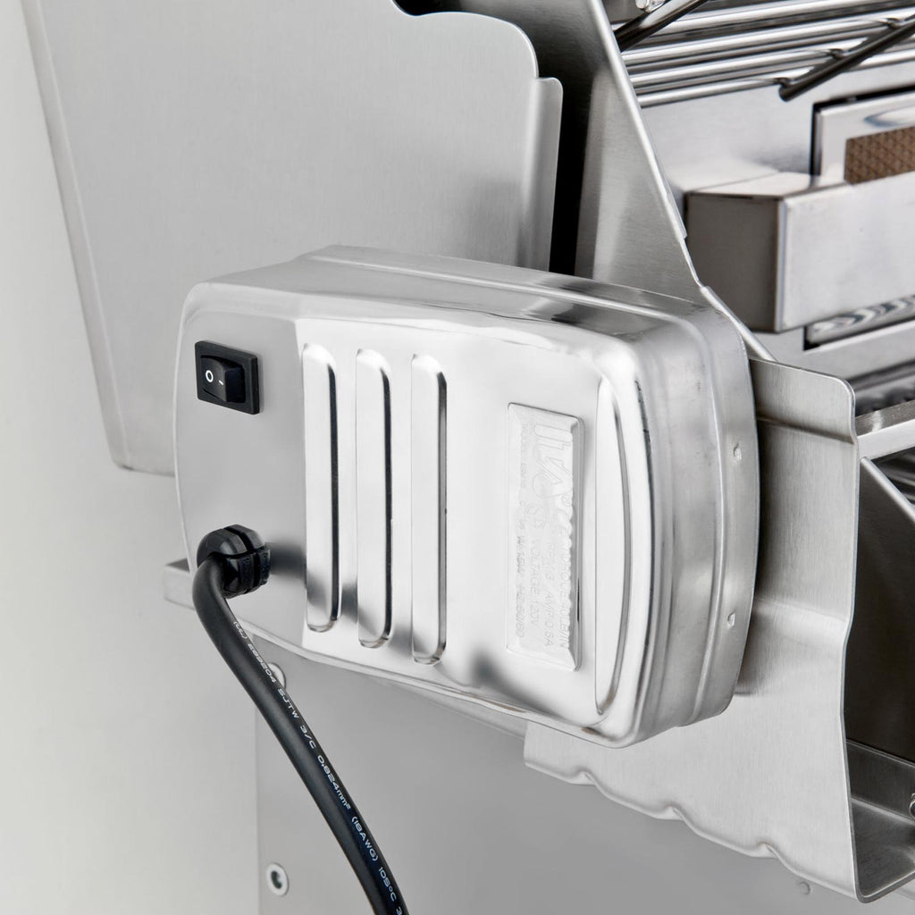 Stainless steel ignition/control unit with power switch and attached gas hose