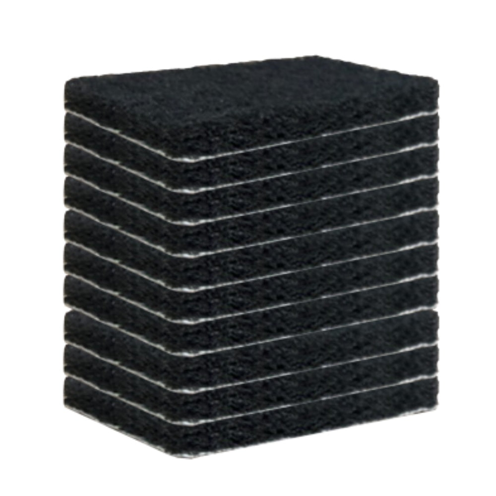Stack of black rectangular scour pads with textured scrub surface and layered edges