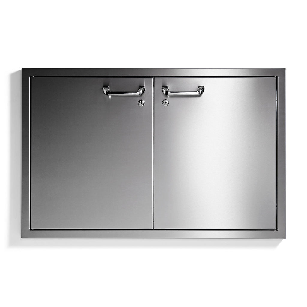 Sealed double-door pantry with black trim, stainless doors, and two top handles