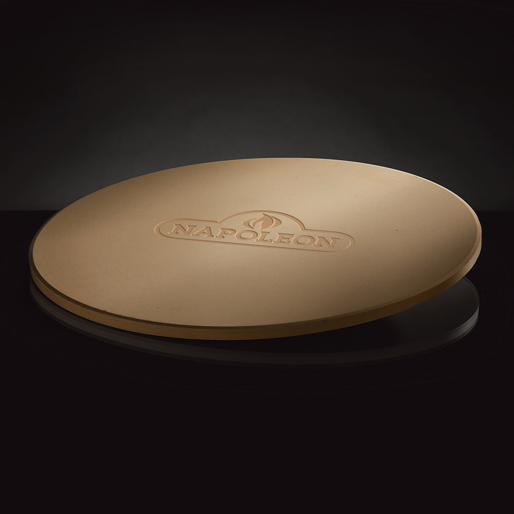 Round pizza stone with embossed Napoleon logo and tan rim
