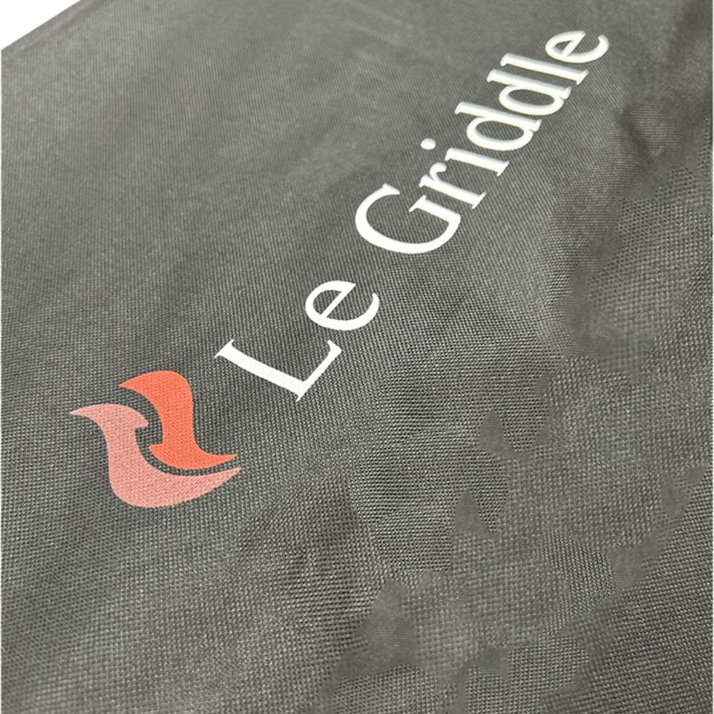 Vinyl grill cover fabric close-up with Le Griddle logo print