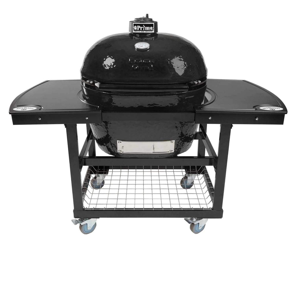 Charcoal ceramic oval kamado grill with closed lid and side shelves on wheeled cart