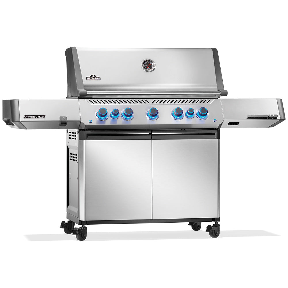 Stainless steel gas grill on cart with blue control knobs and closed lid, front view