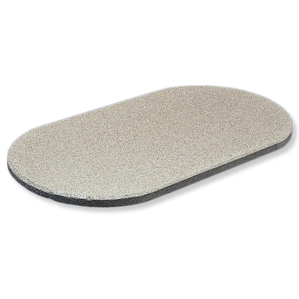 Oval stone baking slab with speckled natural finish and rounded edges