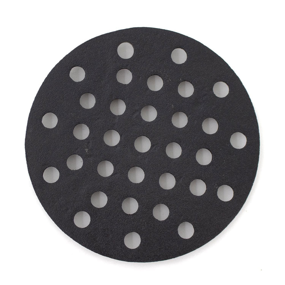 Round cast iron charcoal grate with evenly spaced holes