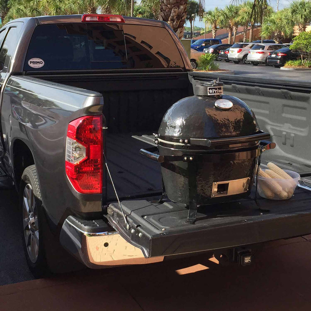 Primo CJRH-321 Junior Oval Ceramic Charcoal Kamado Grill on GO Portable Cradle