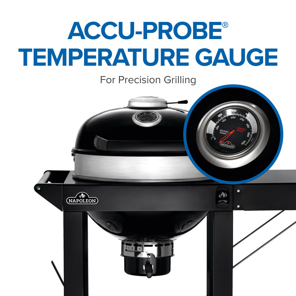 Charcoal kettle grill with ACCU-PROBE temperature gauge on lid, close-up dial