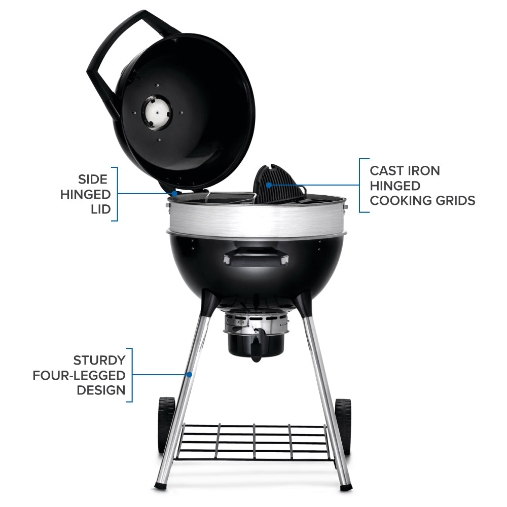 Charcoal kettle grill with side-hinged lid open and cooking grate on three legs