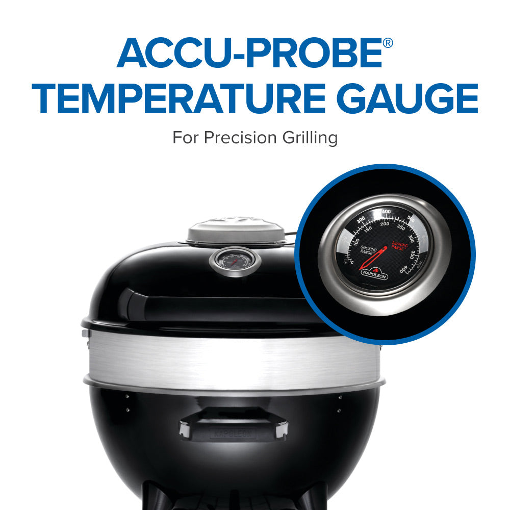 Charcoal kettle grill lid with built-in temperature gauge in the center