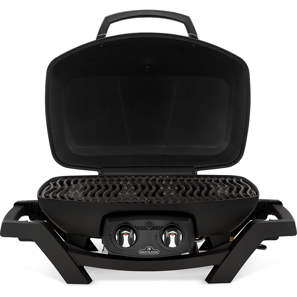 Black portable tabletop gas grill with lid open, showing cooking grate and burner controls