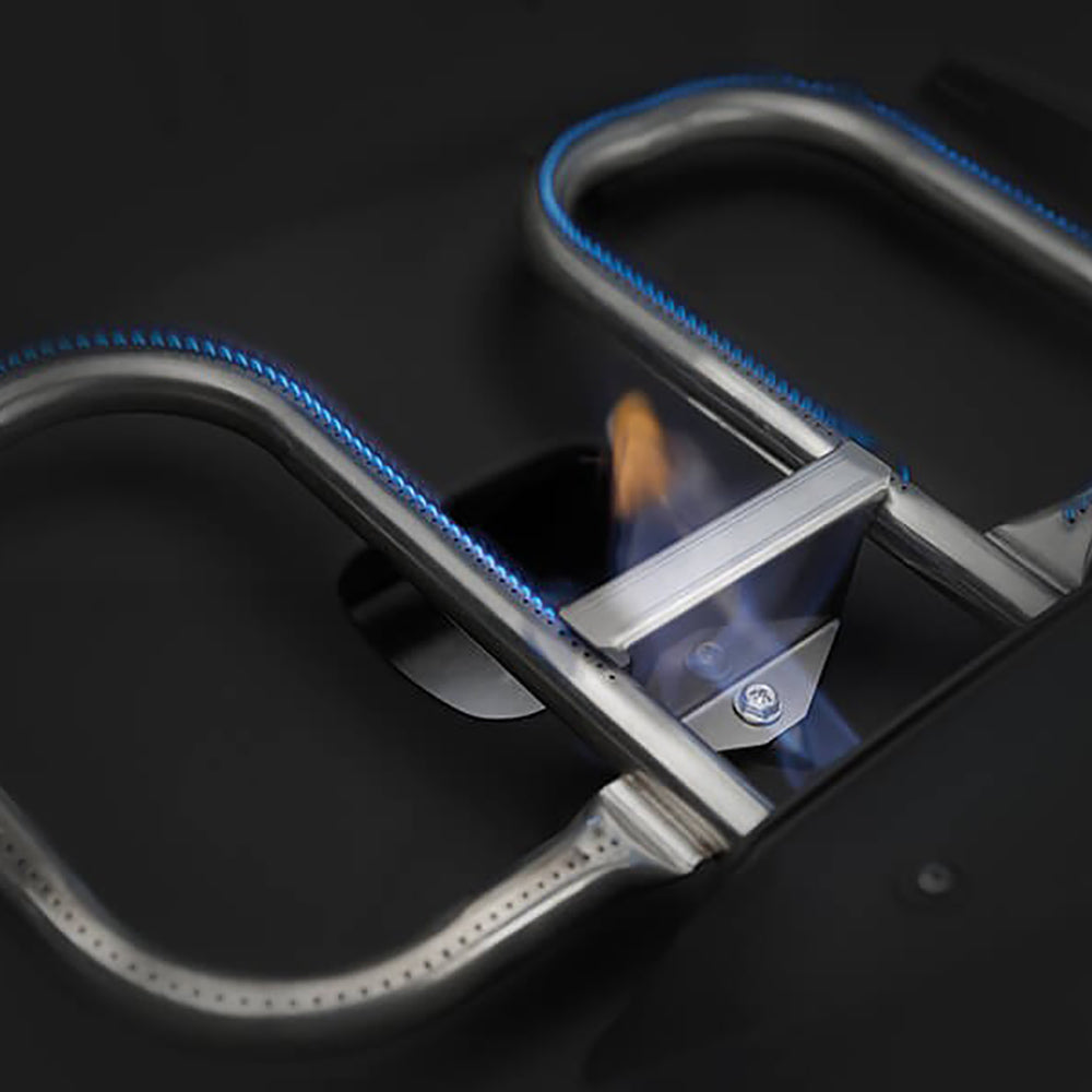 Portable propane grill interior with blue-accented igniter tube and metal burner tube