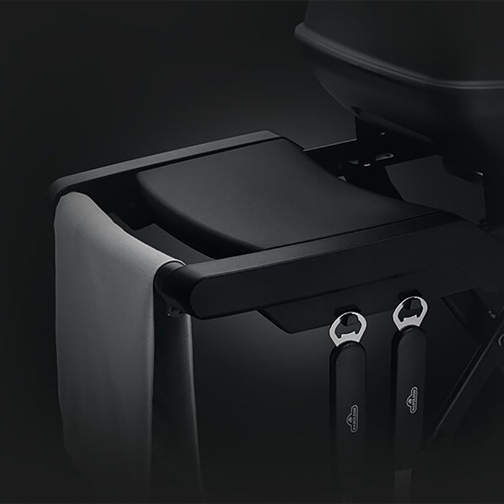 Portable grill side control area with two knobs and folded side shelf