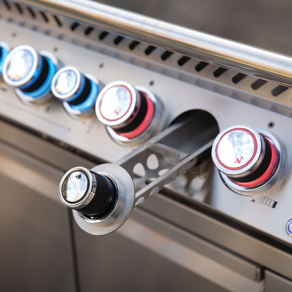 Built-in gas grill control knobs with red and blue markings on stainless panel