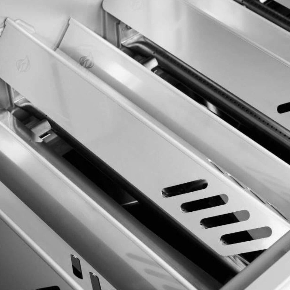 Gas grill interior with stainless warming shelf and vented channel above the grates