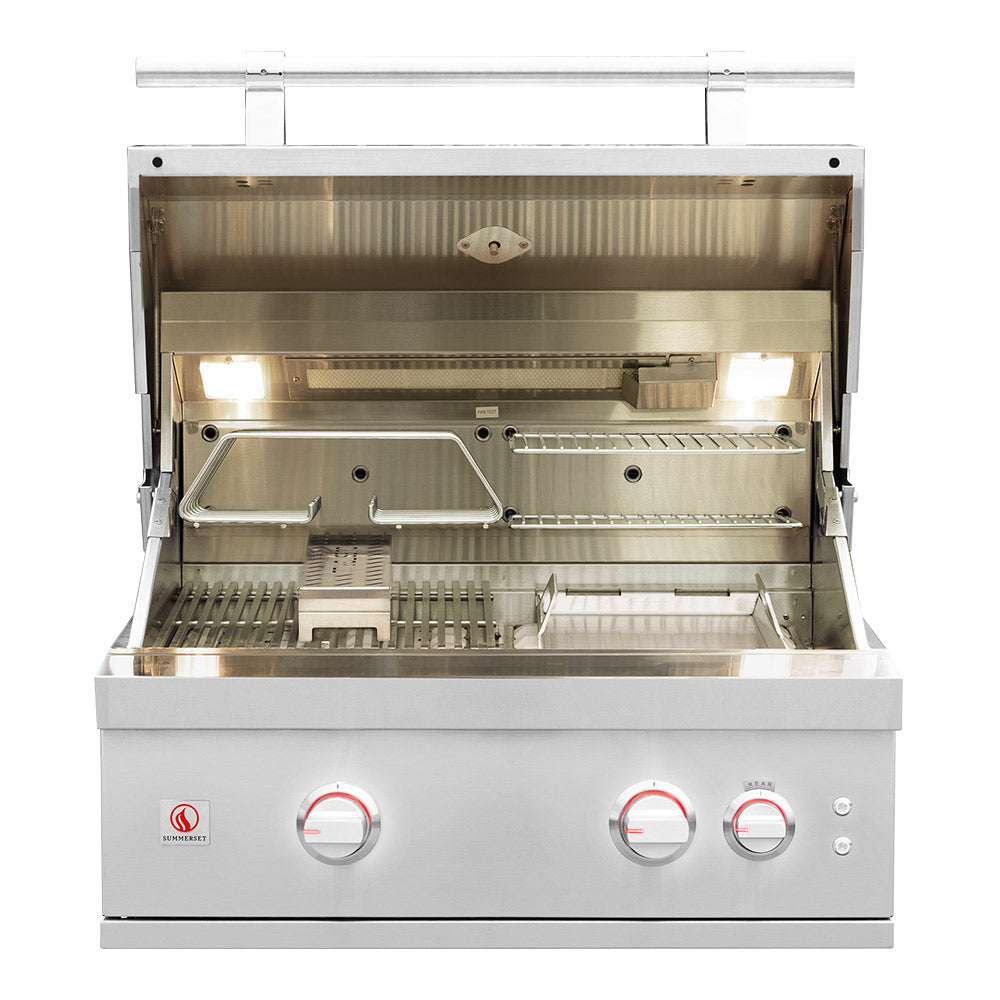 Open stainless gas grill with burners, cooking grates, and control panel