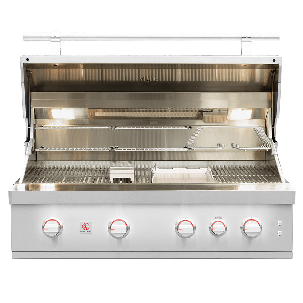 Open built-in gas grill with cooking grates, burners, and front control knobs