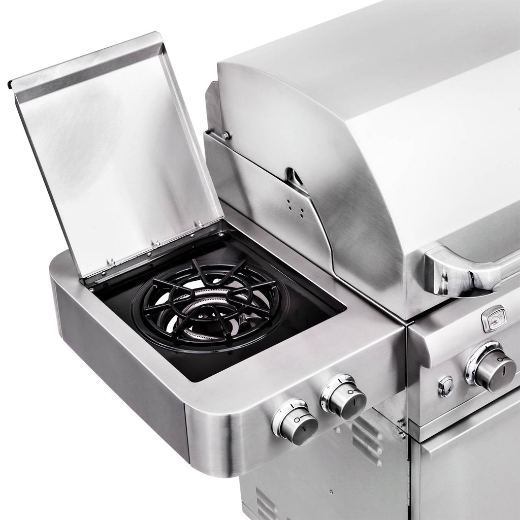 Stainless steel side burner with open lid and dual control knobs on freestanding grill