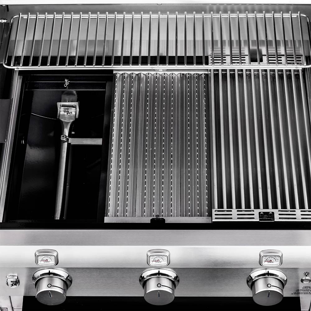Infrared grill cooking area with ribbed heating elements and metal grates, burners recessed