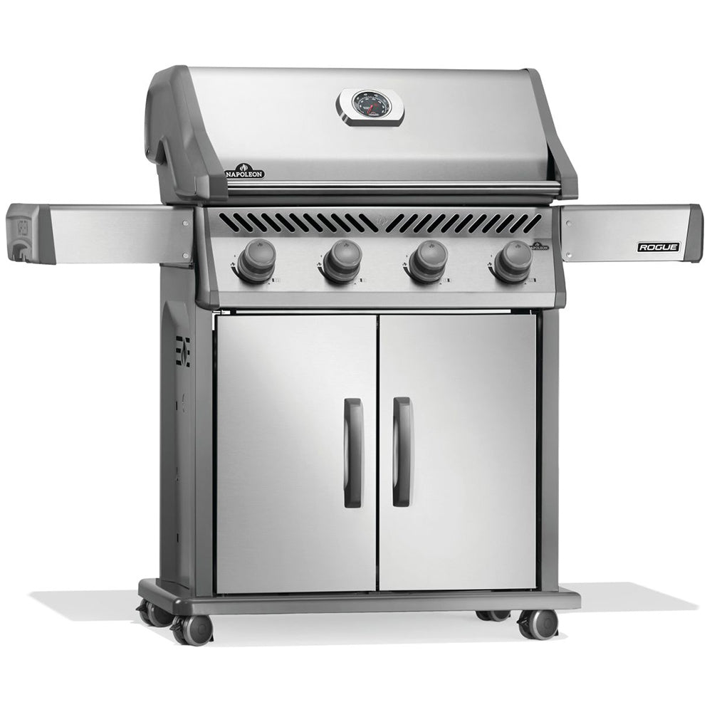 Stainless steel gas grill on cart with four front burner knobs and cabinet doors