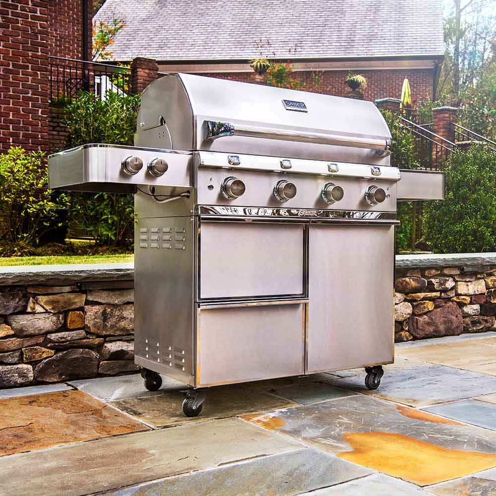 Stainless steel 4-burner infrared freestanding grill with closed lid and front cabinet doors