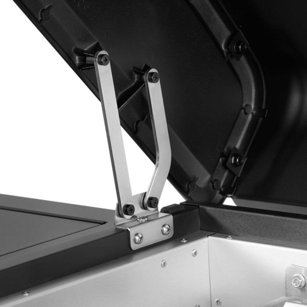 Grill lid support brackets and hinge hardware above the open drip tray