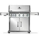 Stainless steel gas grill on cart with infrared side burner, control knobs, two cabinet doors