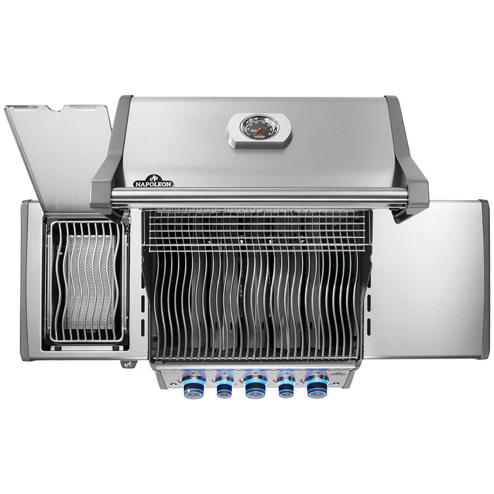 Gas grill with lid open, cooking grates and infrared burner housing, front knobs