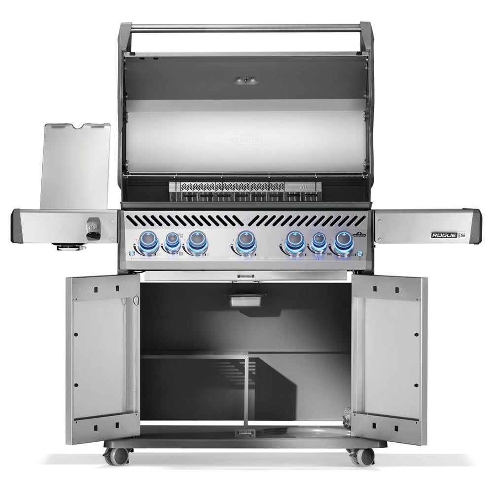 Open stainless steel gas grill with burner controls and interior cooking compartment