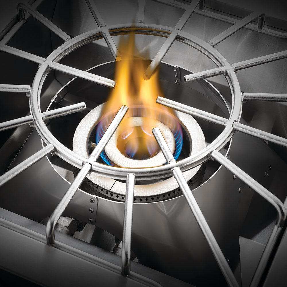 Stainless steel burner grate with ring supports and center flame, gas cooktop