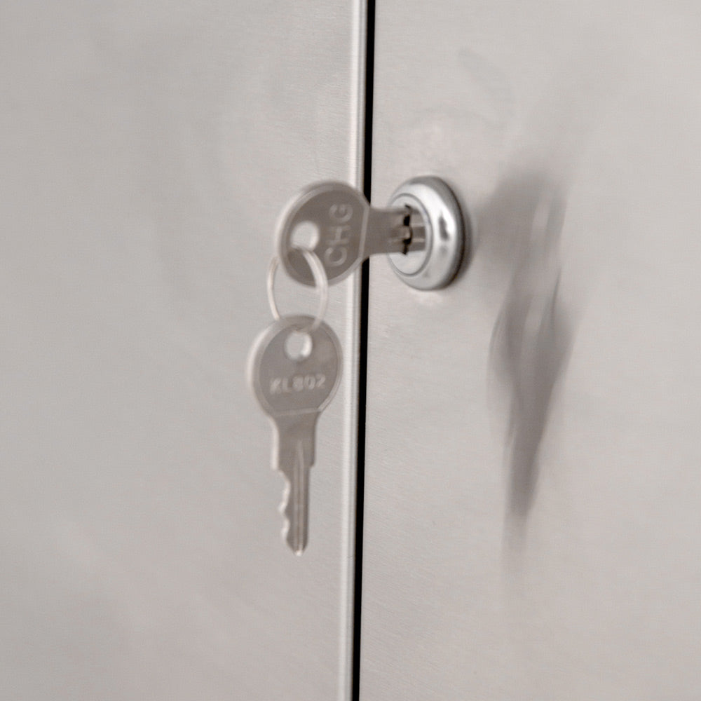 Built-in gas grill ignition knob with keyhole on stainless side panel
