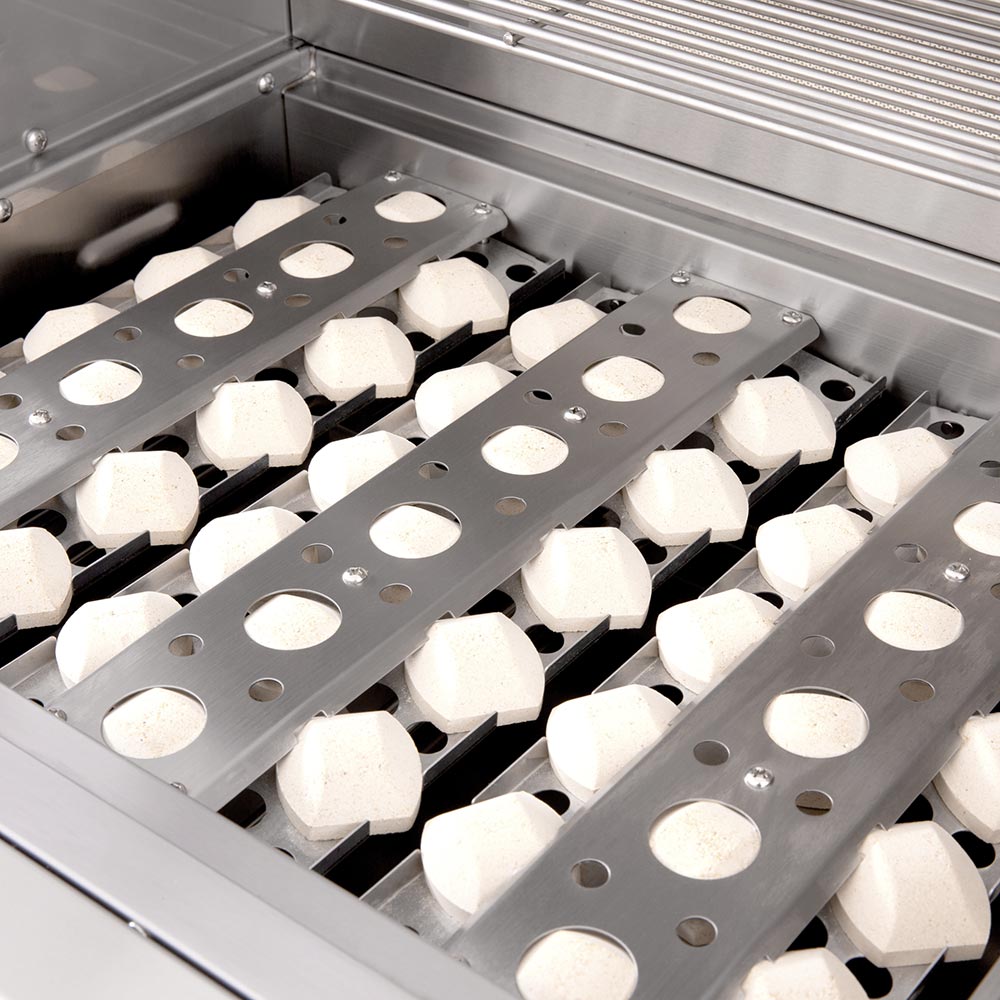 Infrared searing burner tray with multiple white ceramic blocks inside grill firebox