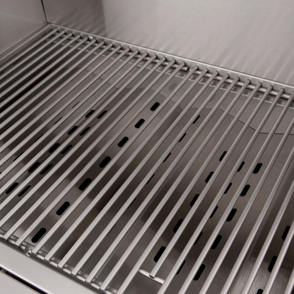 Stainless cooking grates with evenly spaced slots inside built-in gas grill