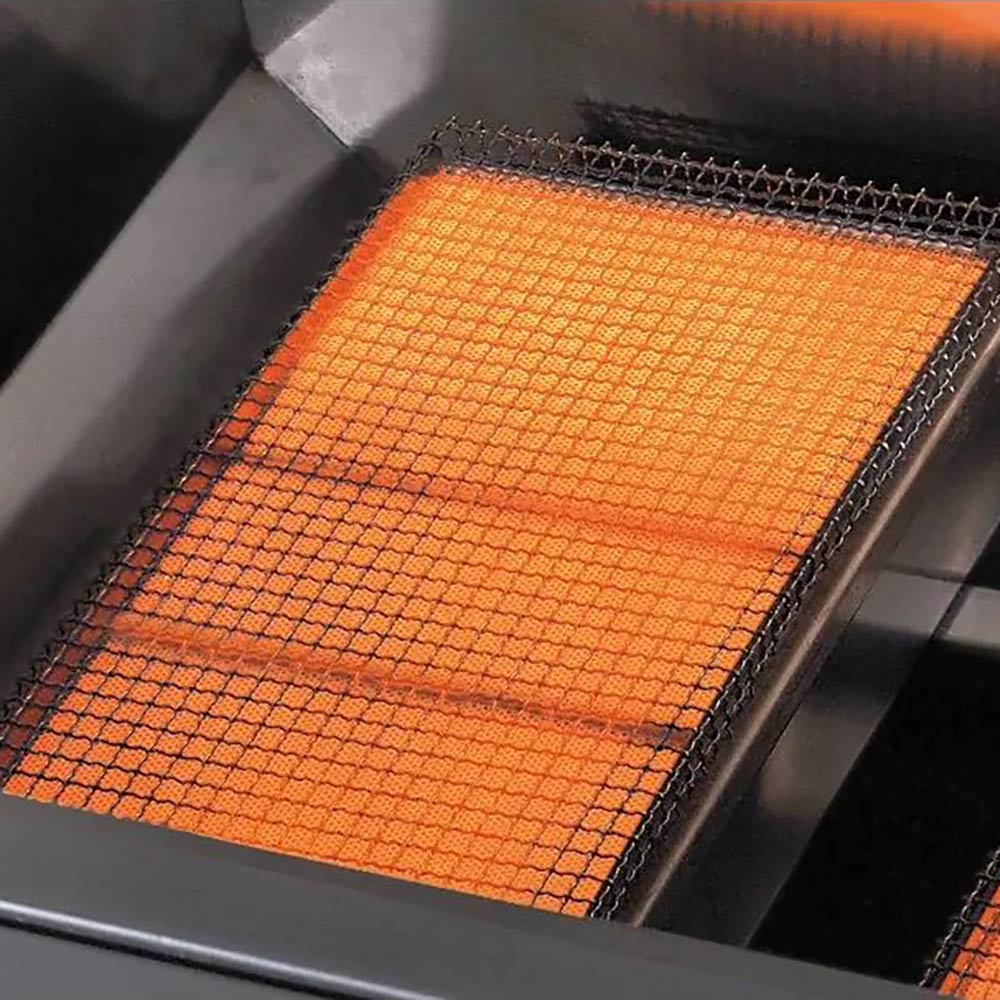Rotisserie cooking grid with orange heat glow over metal grill surface