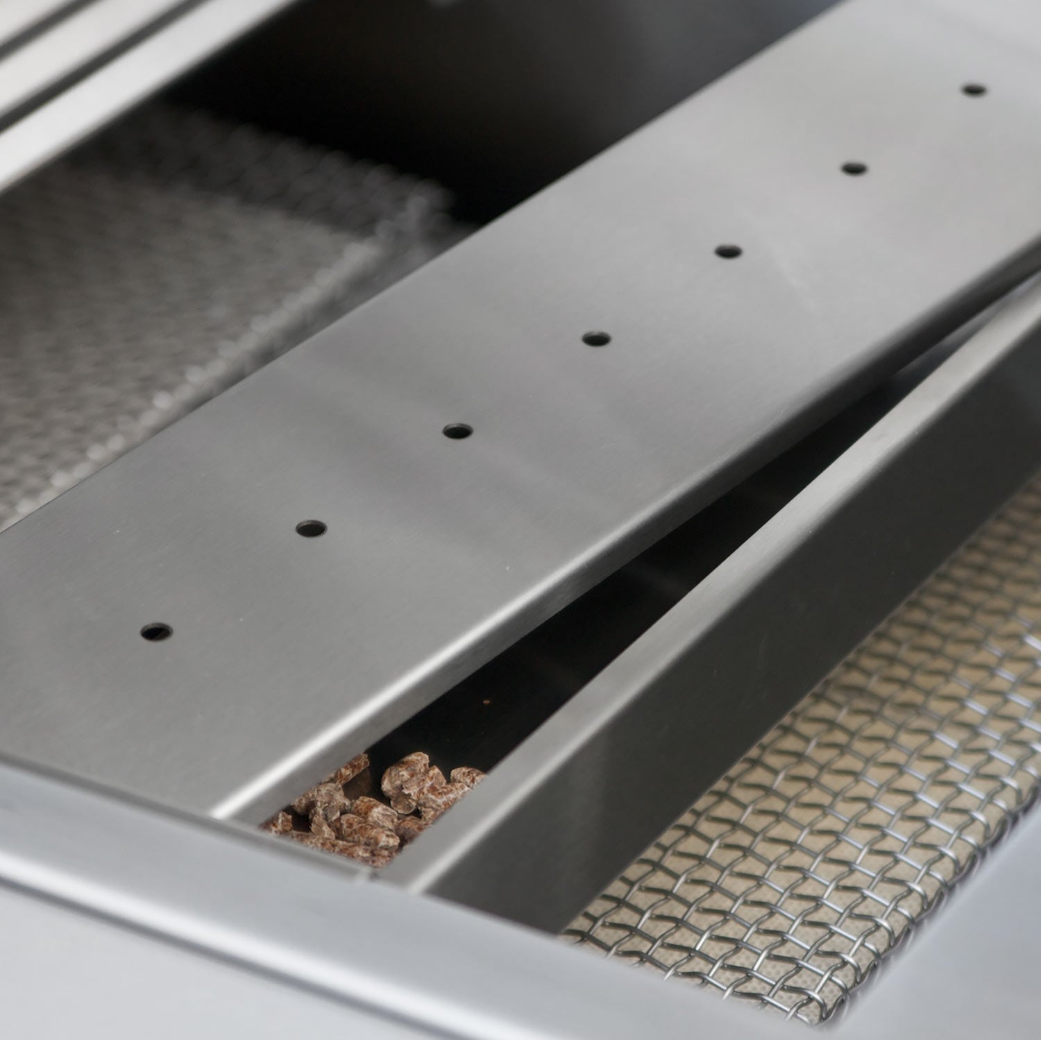 Stainless steel wood chip smoker box with perforated lid and wood chips