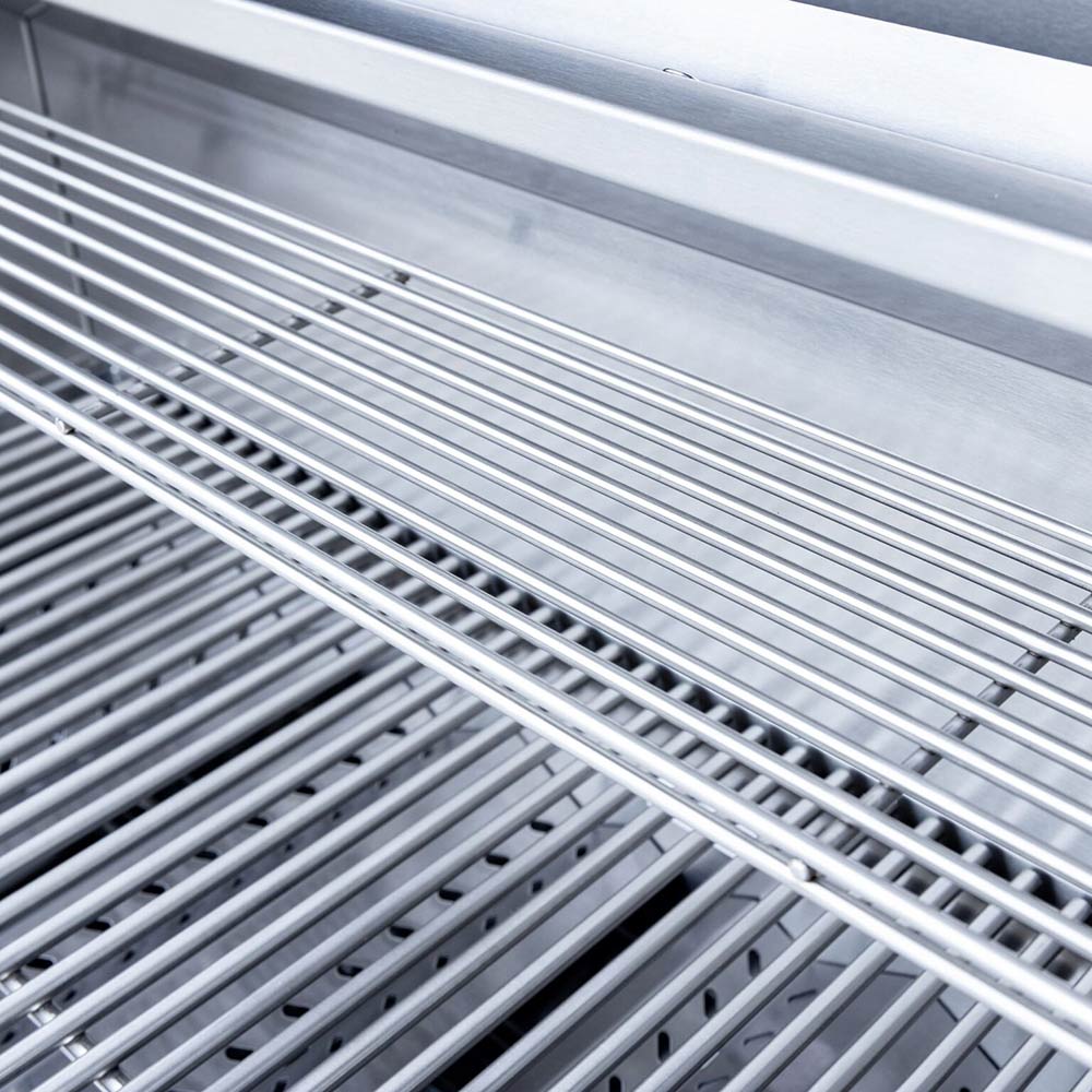 Stainless cooking grates and lower supports inside open built-in grill